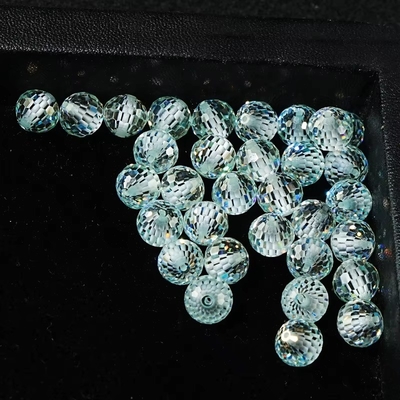 Matériau de pierre précieuse synthétique de laboratoire créé des perles de moissanite bleu rond pour la fabrication de bijoux